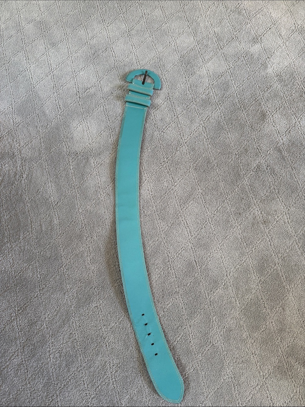 Turquoise curved belt